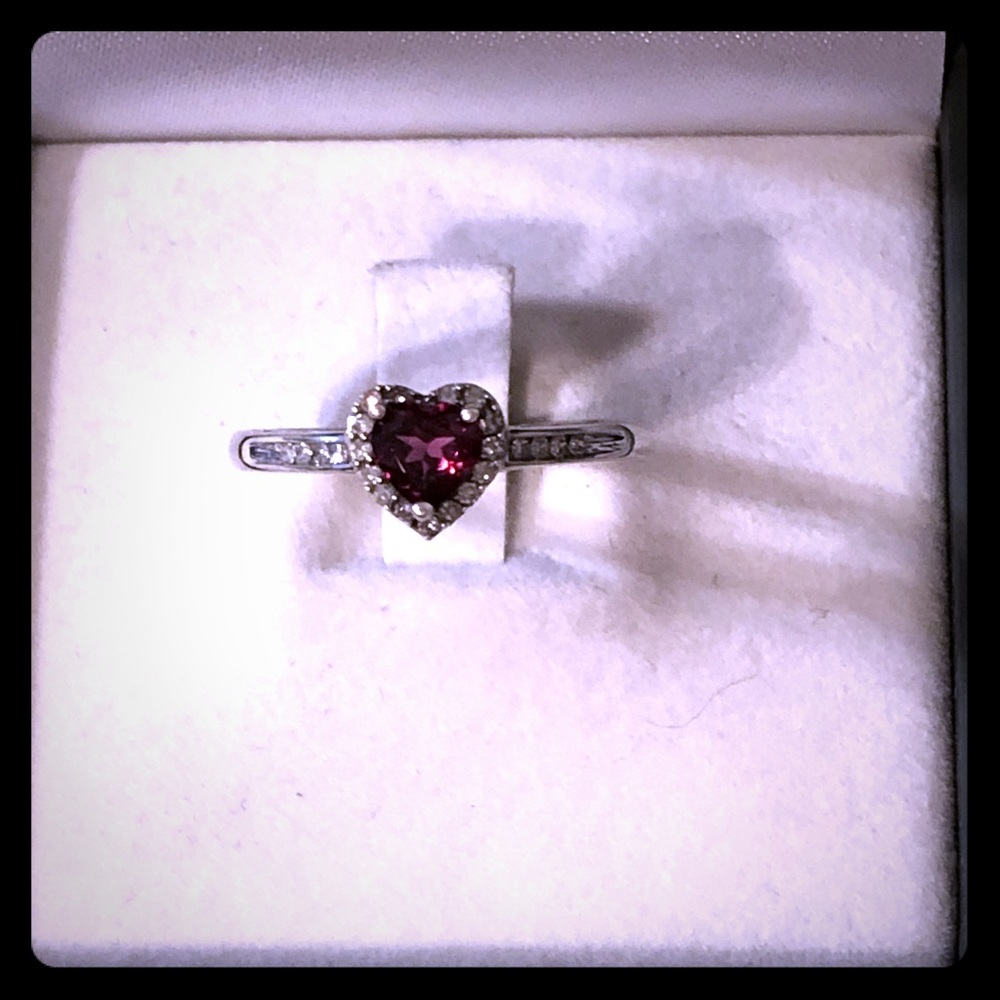 Pink sapphire and diamond ring